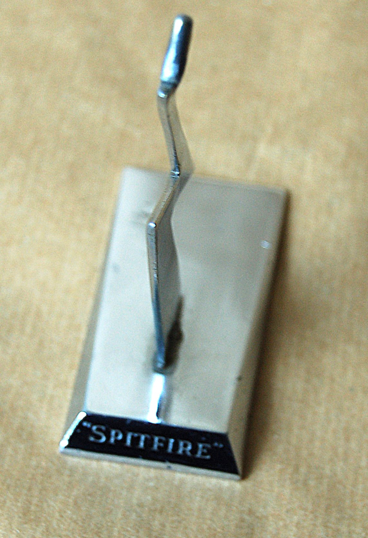 Metal stand for Spitfire dated 1940 for sale